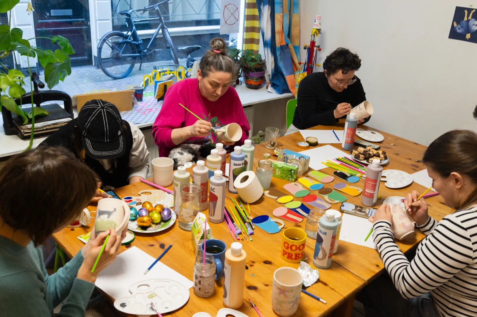 Friends at pottery workshop